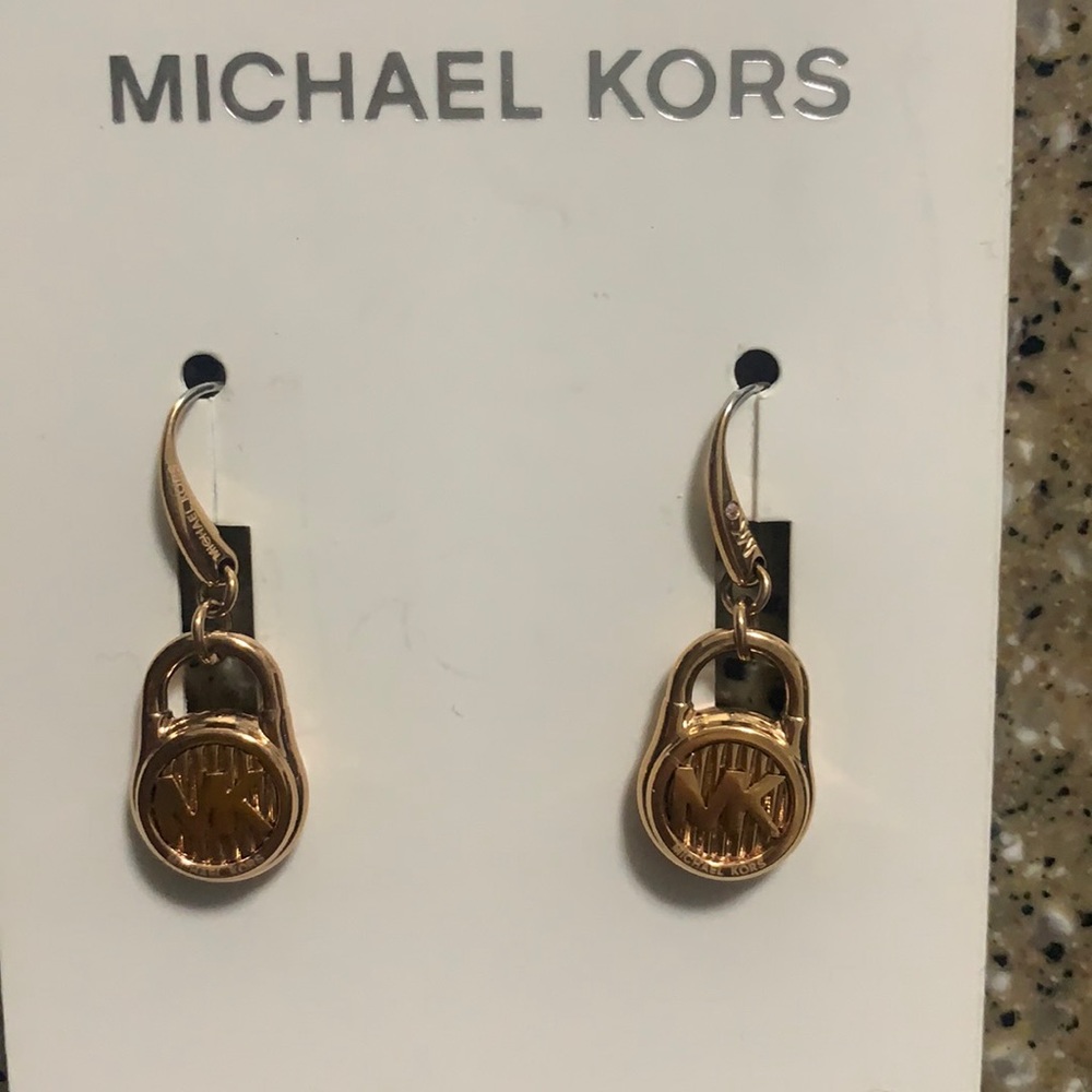 Brand new rose gold Michael Kors earrings
